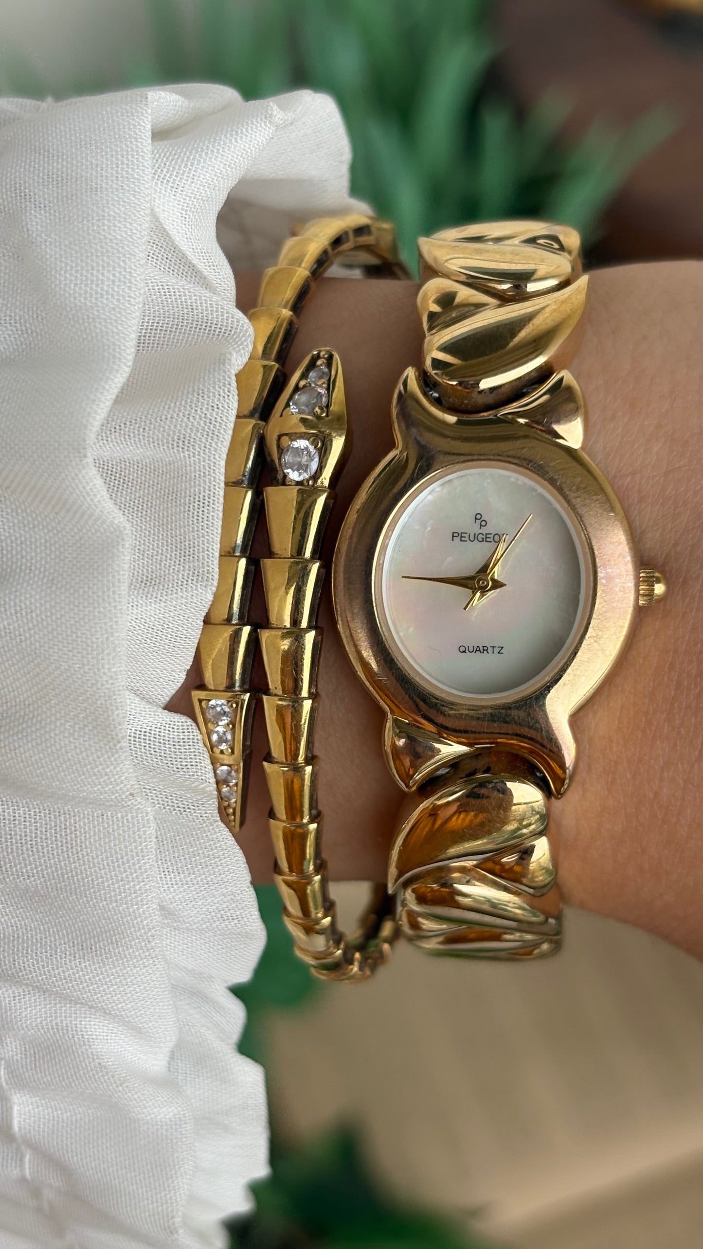 Vintage Peugeot Watch in Gold Tone Pearl Dial Heart Straps