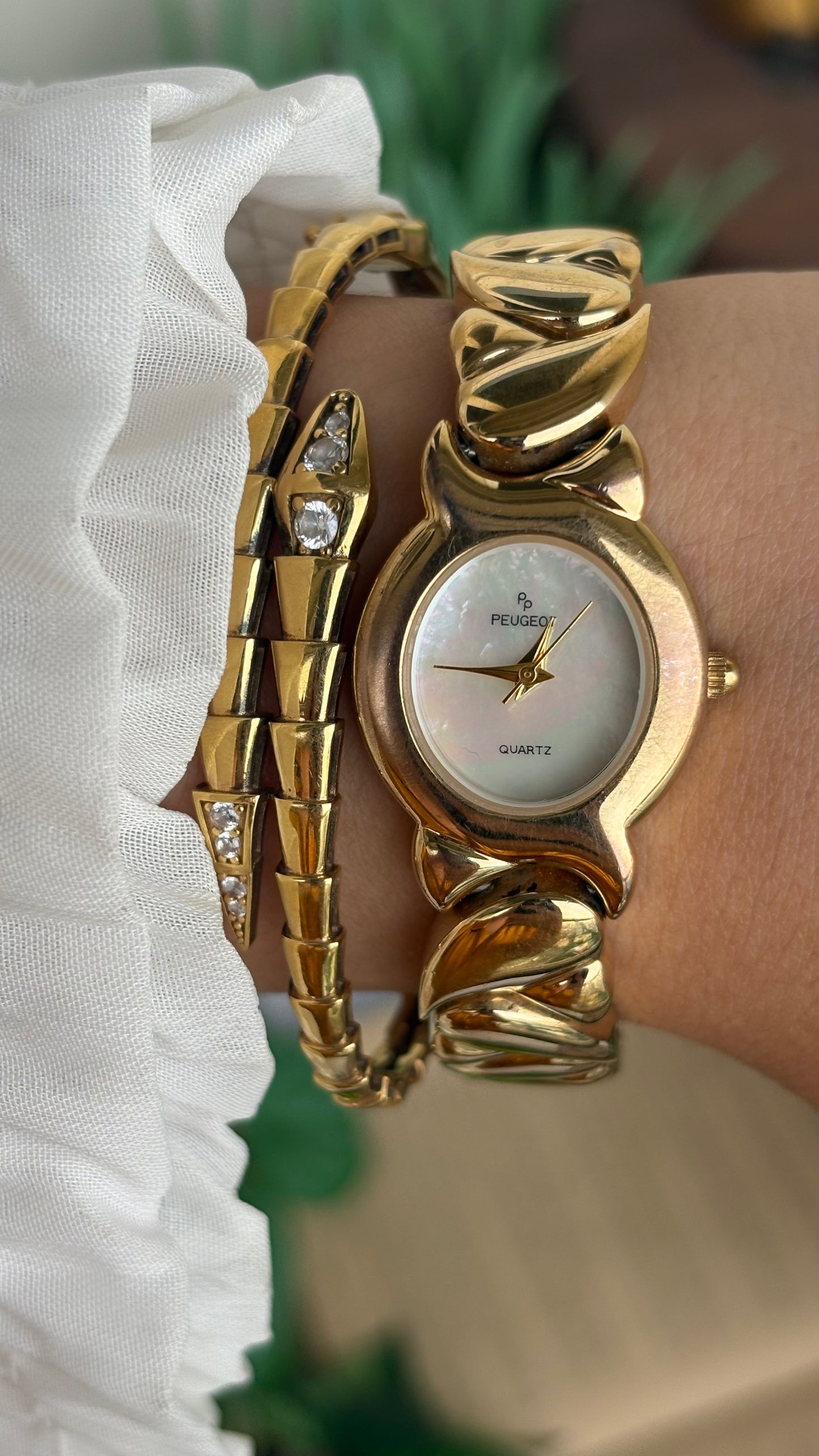 Vintage Peugeot Watch in Gold Tone Pearl Dial Heart Straps
