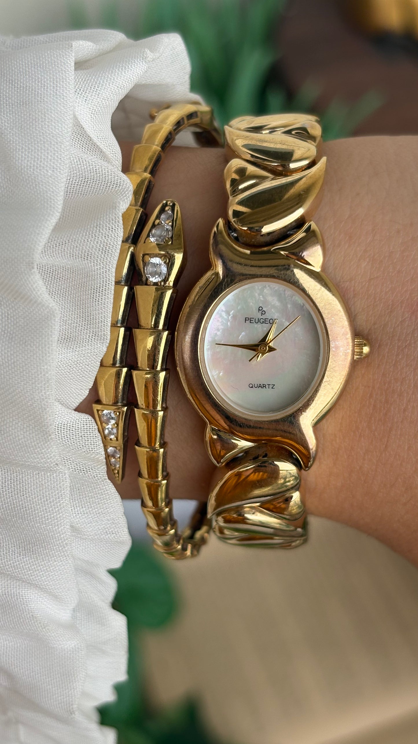Vintage Peugeot Watch in Gold Tone Pearl Dial Heart Straps