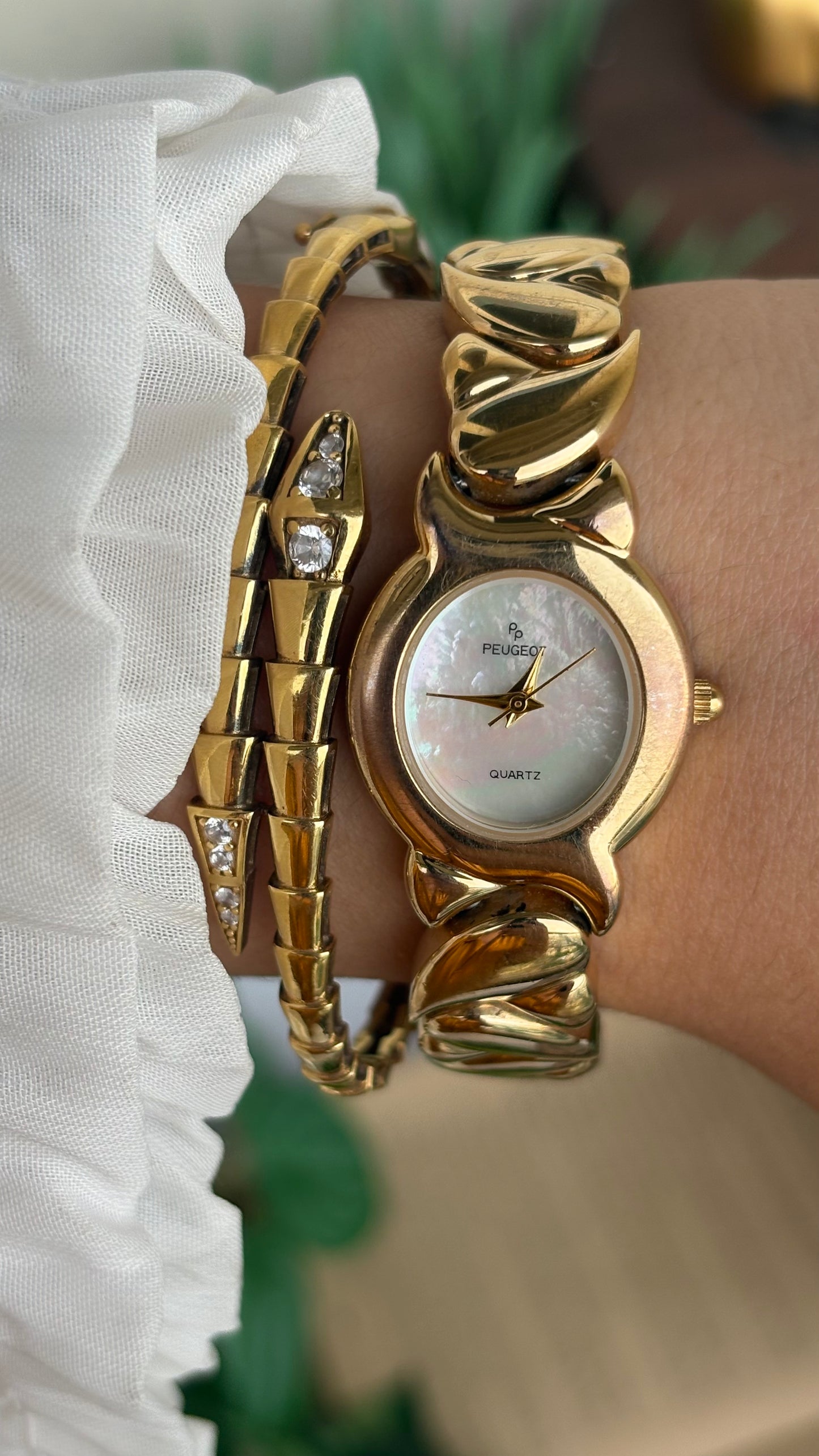Vintage Peugeot Watch in Gold Tone Pearl Dial Heart Straps