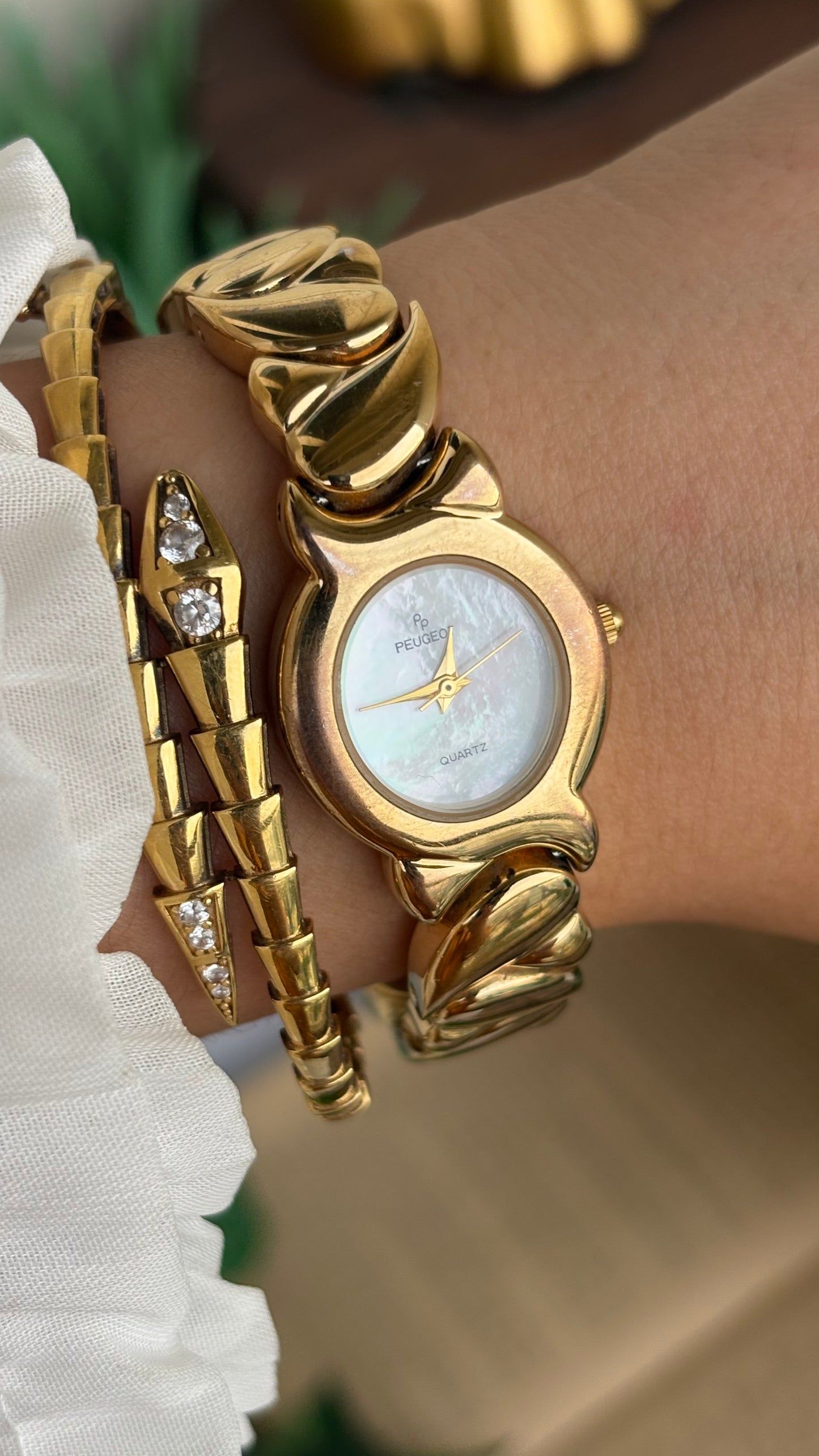 Vintage Peugeot Watch in Gold Tone Pearl Dial Heart Straps