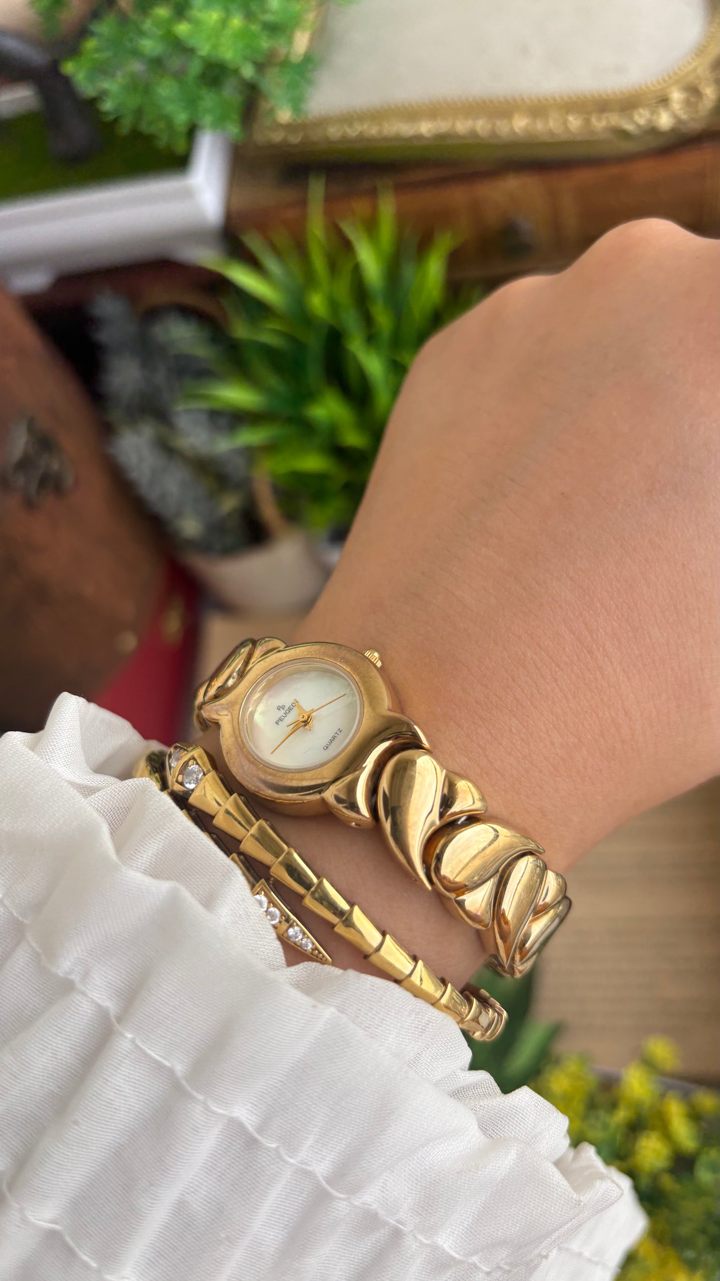 Vintage Peugeot Watch in Gold Tone Pearl Dial Heart Straps
