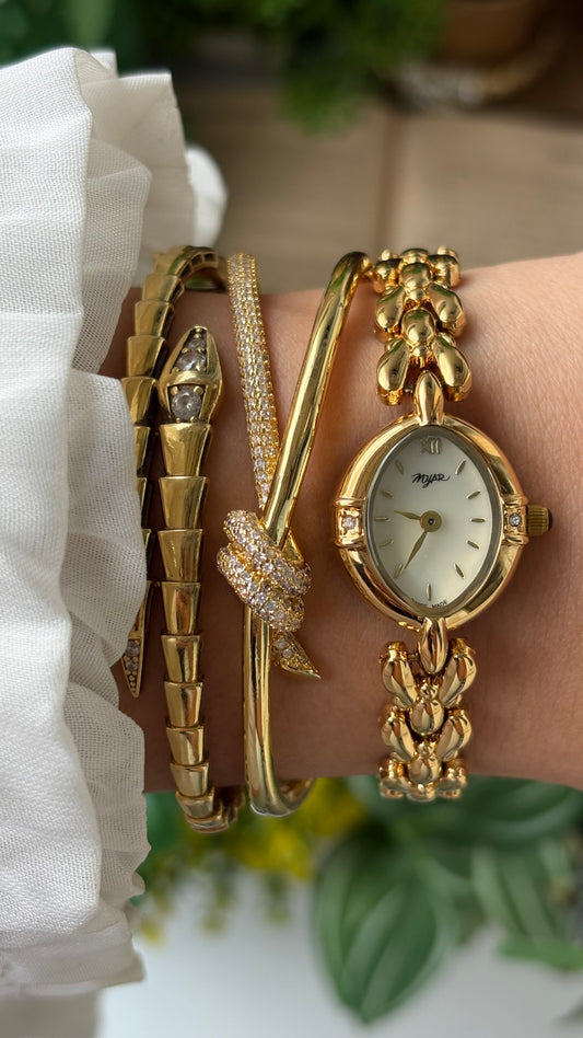 Vintage Myar Swiss Rhinestone Watch in Gold Tone Oval Dial Mother of Pearl Dial Quartz