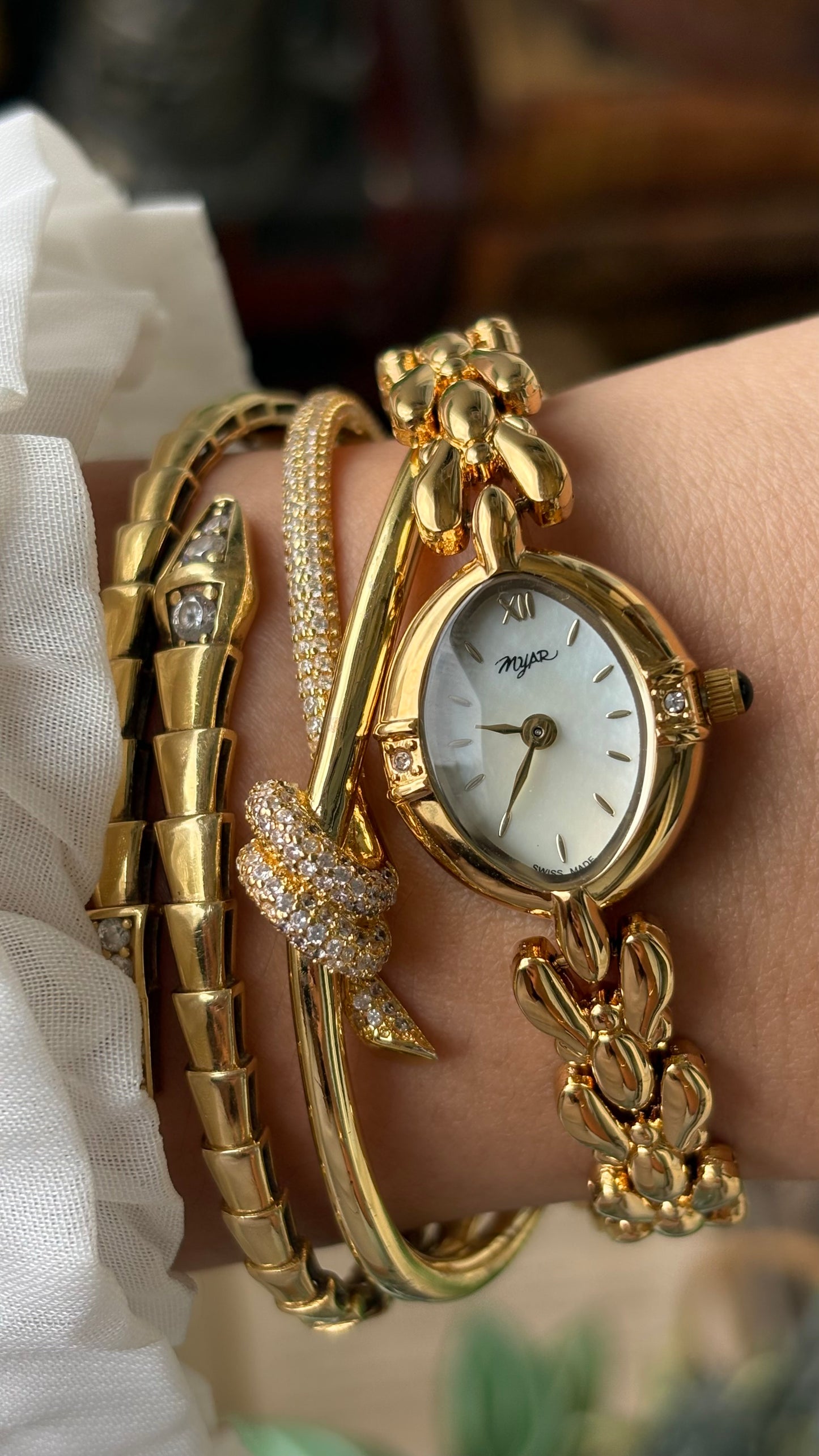 Vintage Myar Swiss Rhinestone Watch in Gold Tone Oval Dial Mother of Pearl Dial Quartz