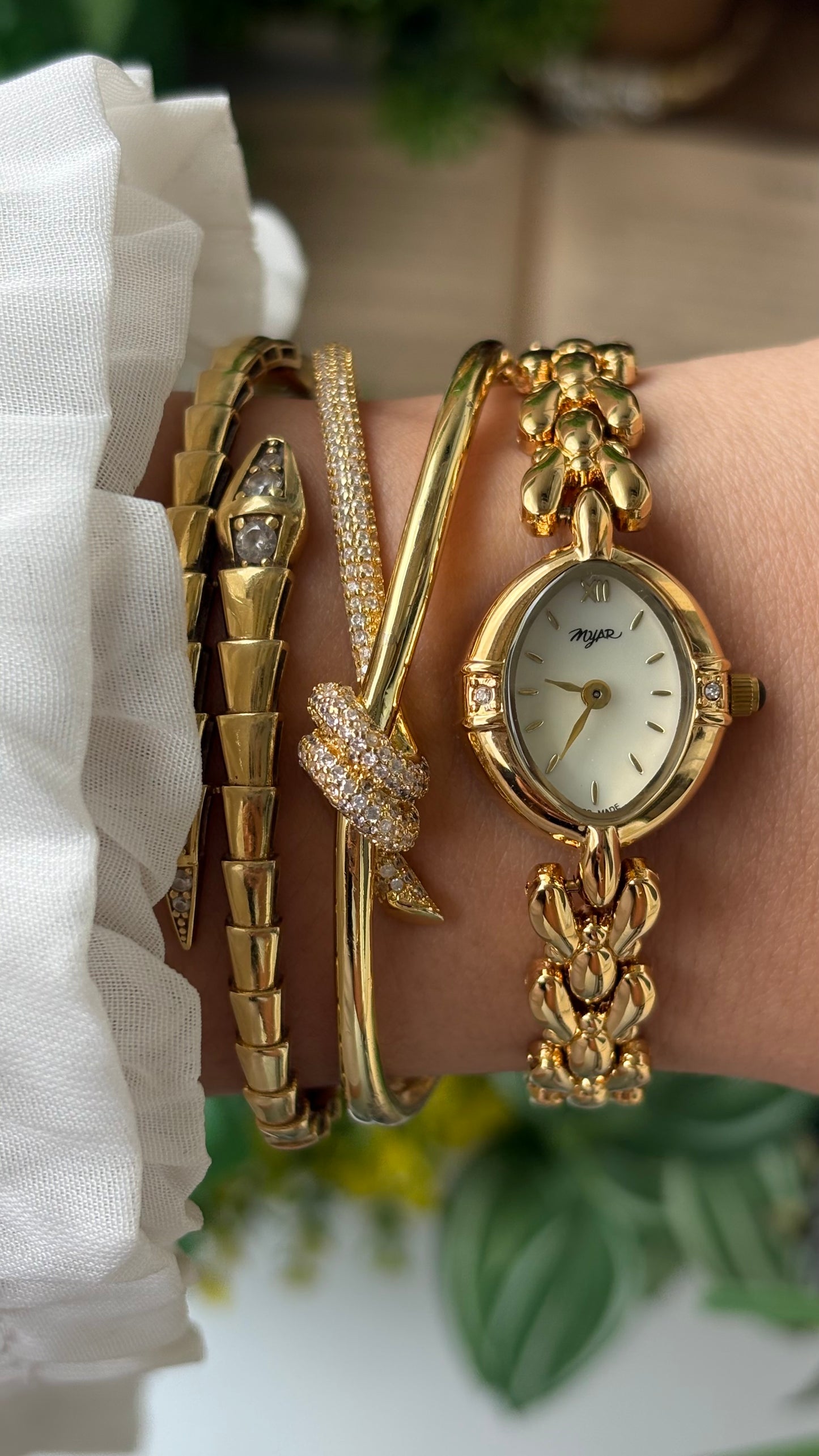 Vintage Myar Swiss Rhinestone Watch in Gold Tone Oval Dial Mother of Pearl Dial Quartz