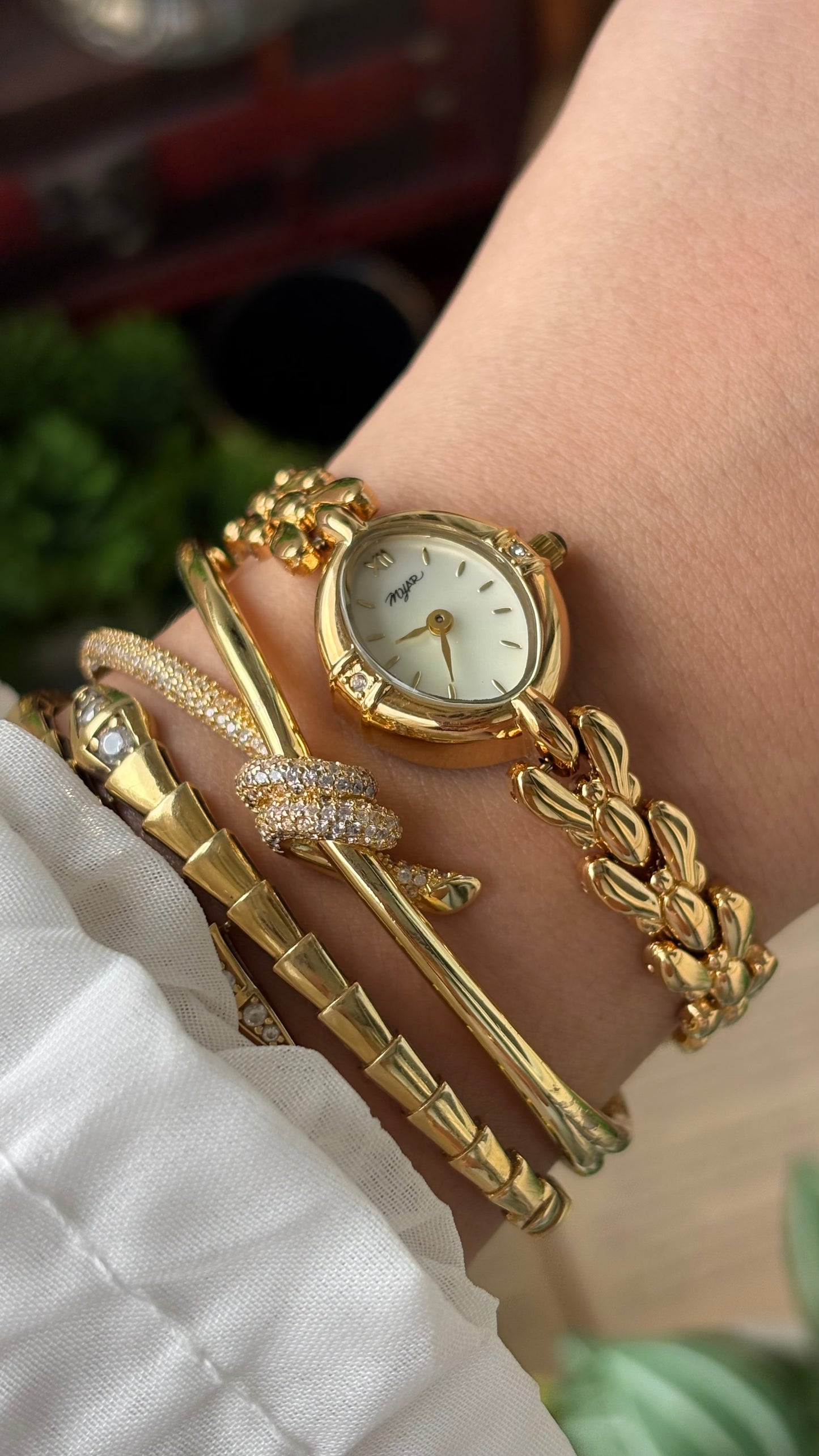 Vintage Myar Swiss Rhinestone Watch in Gold Tone Oval Dial Mother of Pearl Dial Quartz