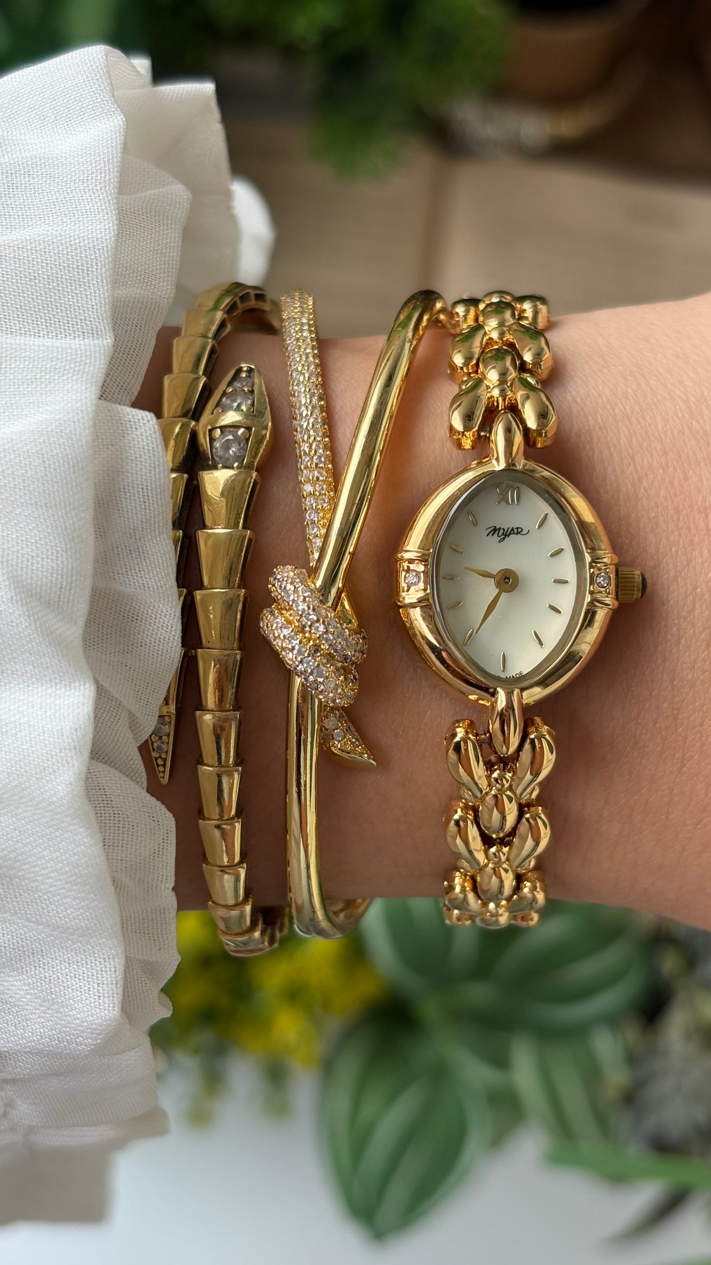 Vintage Myar Swiss Rhinestone Watch in Gold Tone Oval Dial Mother of Pearl Dial Quartz