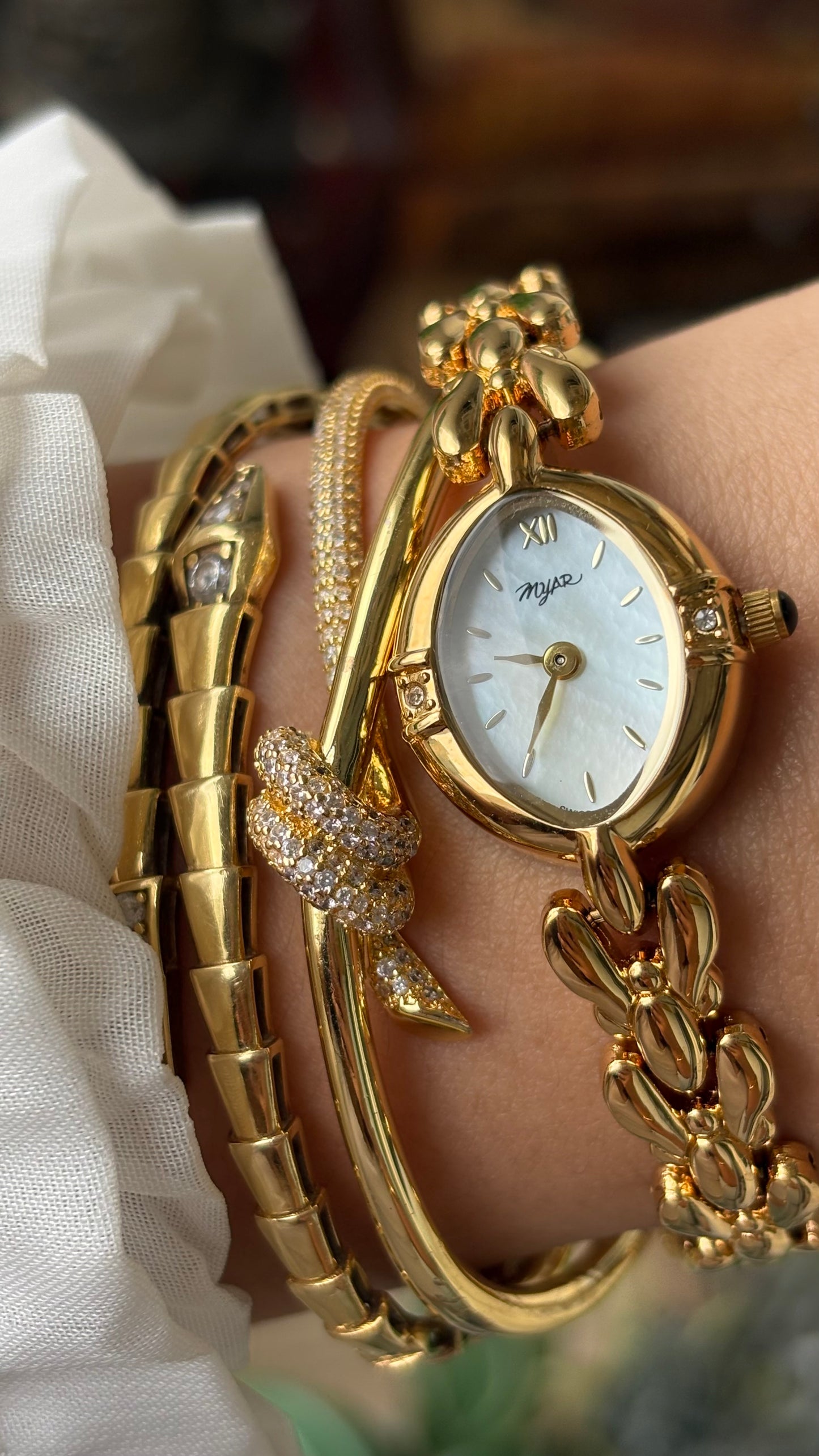 Vintage Myar Swiss Rhinestone Watch in Gold Tone Oval Dial Mother of Pearl Dial Quartz