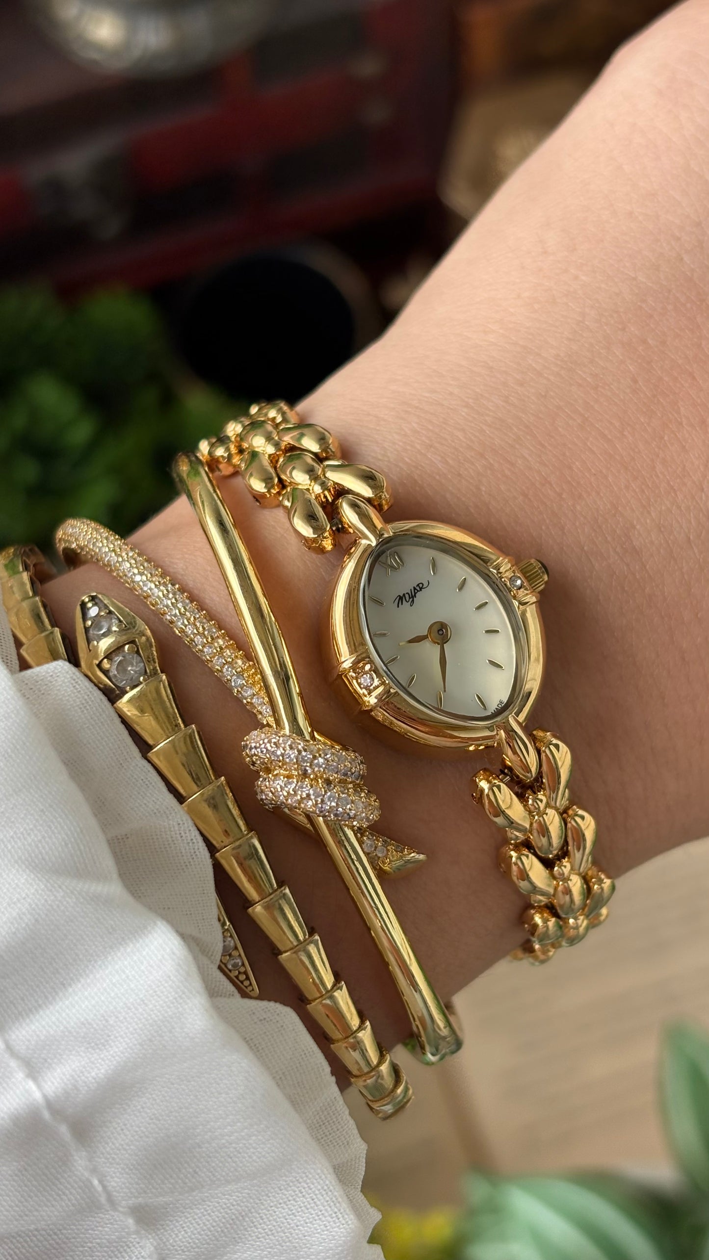 Vintage Myar Swiss Rhinestone Watch in Gold Tone Oval Dial Mother of Pearl Dial Quartz