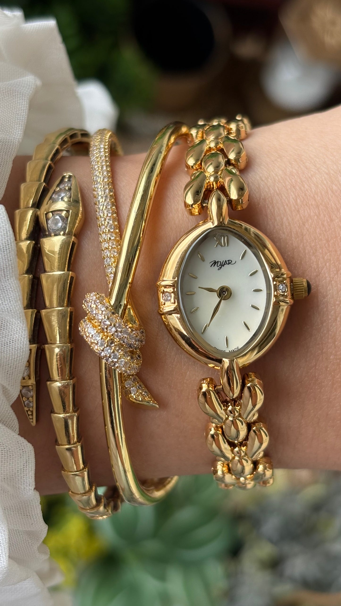 Vintage Myar Swiss Rhinestone Watch in Gold Tone Oval Dial Mother of Pearl Dial Quartz