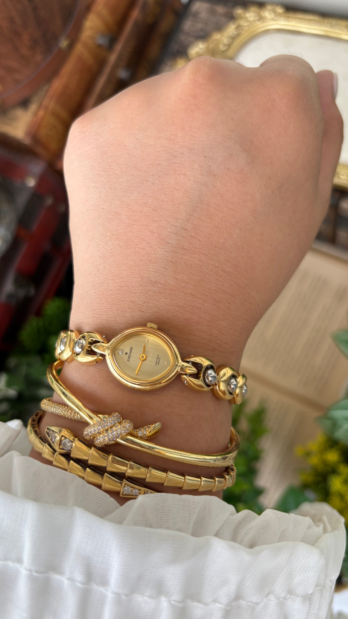 Vintage Dainty Junghans Astra Watch in Gold Tone Almond Dial Quartz