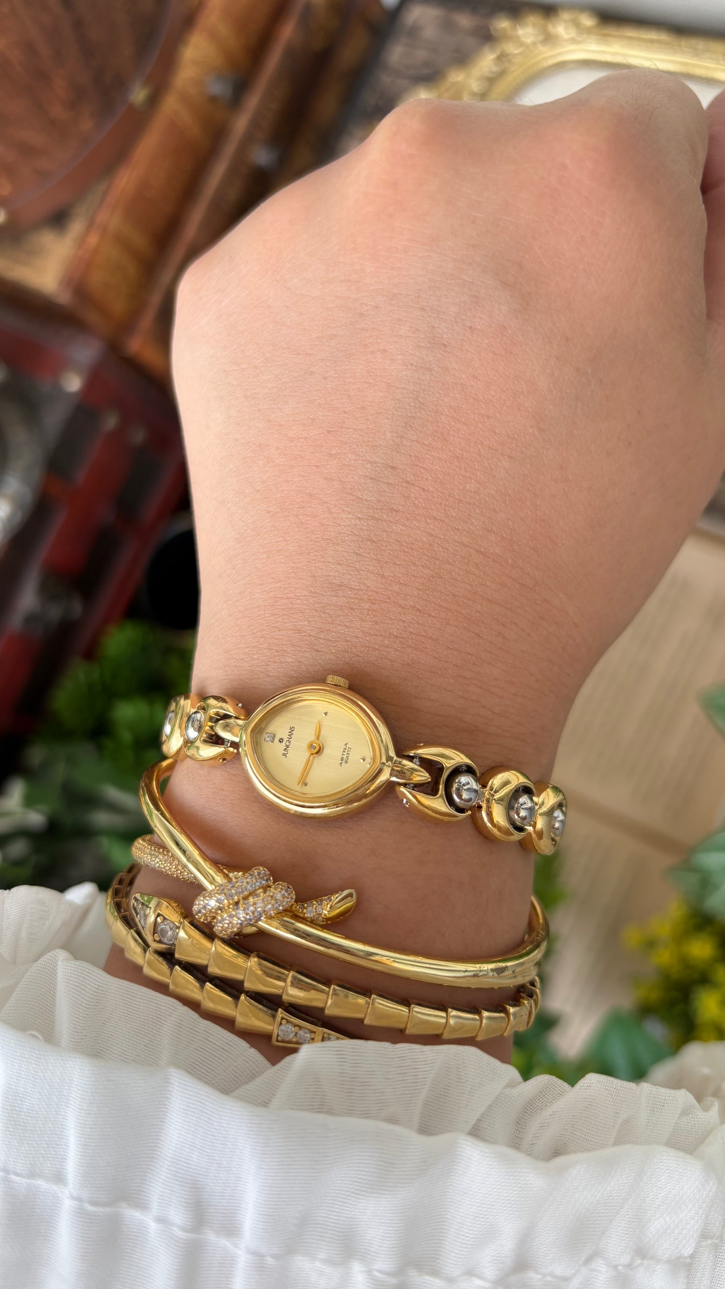 Vintage Dainty Junghans Astra Watch in Gold Tone Almond Dial Quartz