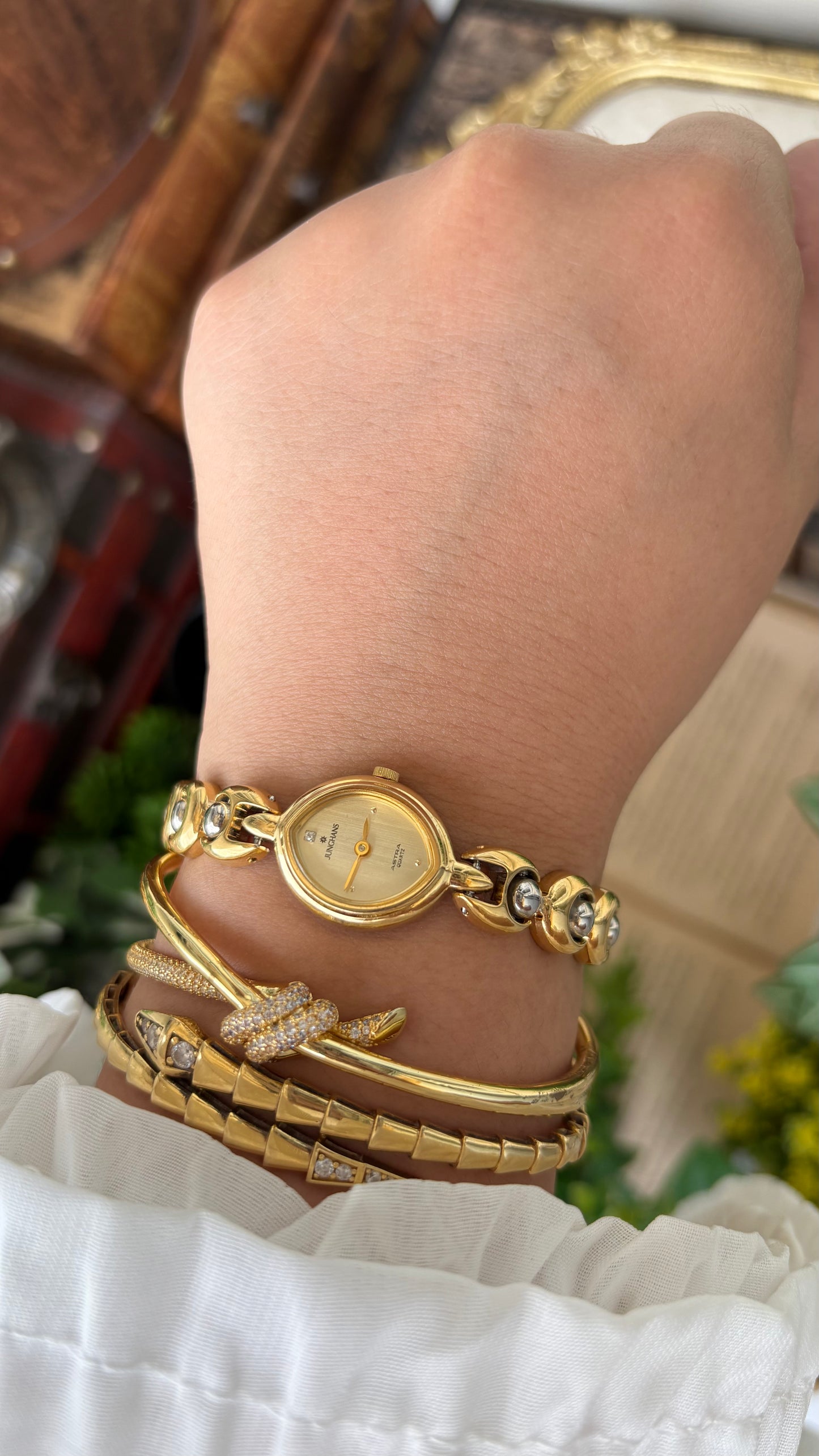 Vintage Dainty Junghans Astra Watch in Gold Tone Almond Dial Quartz