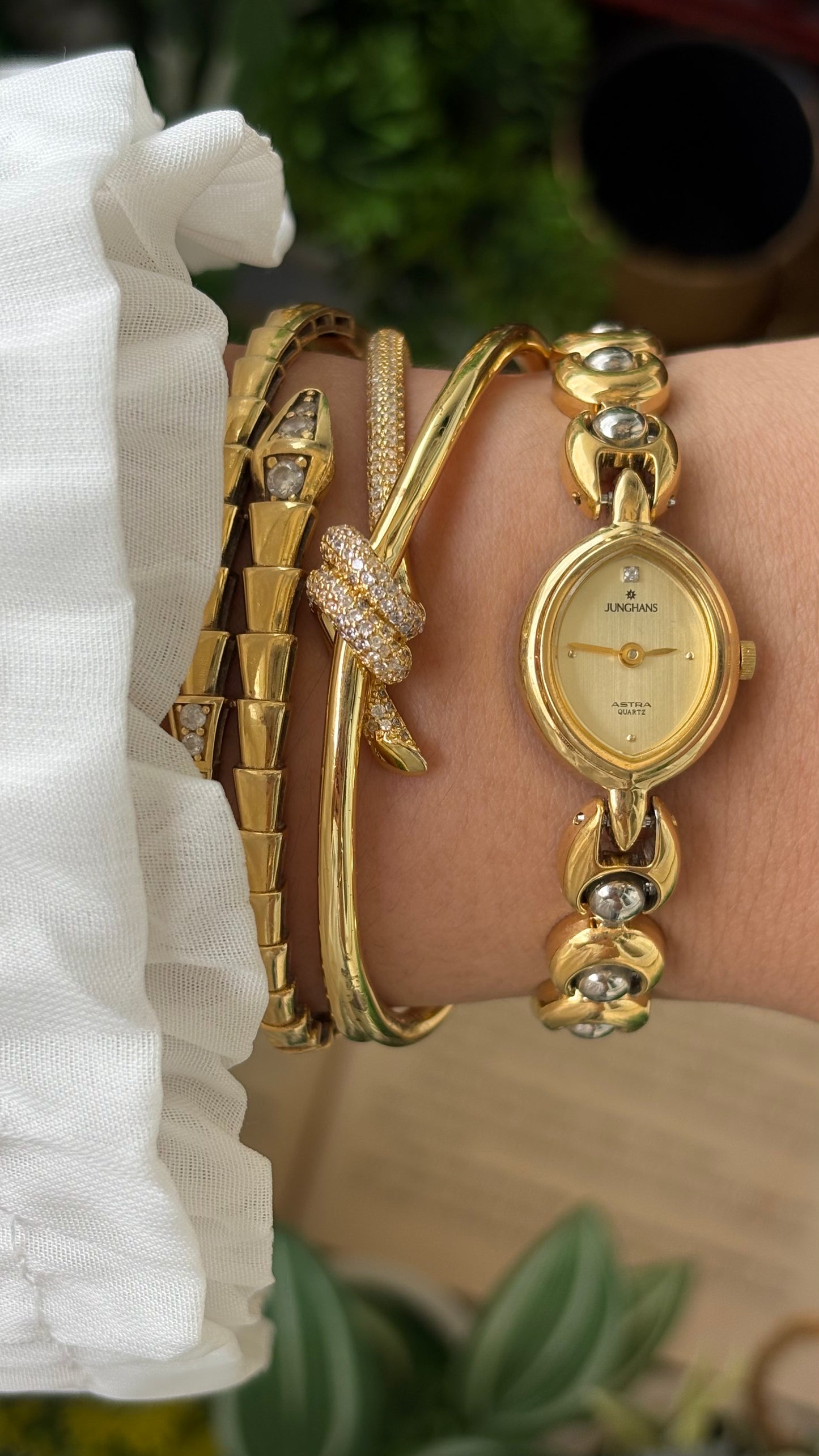 Vintage Dainty Junghans Astra Watch in Gold Tone Almond Dial Quartz