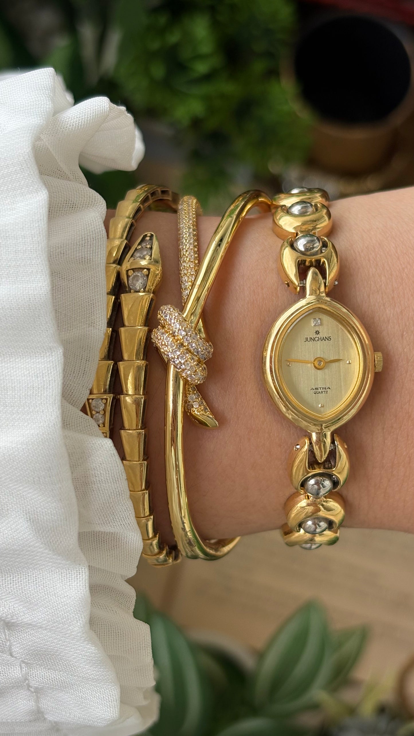 Vintage Dainty Junghans Astra Watch in Gold Tone Almond Dial Quartz