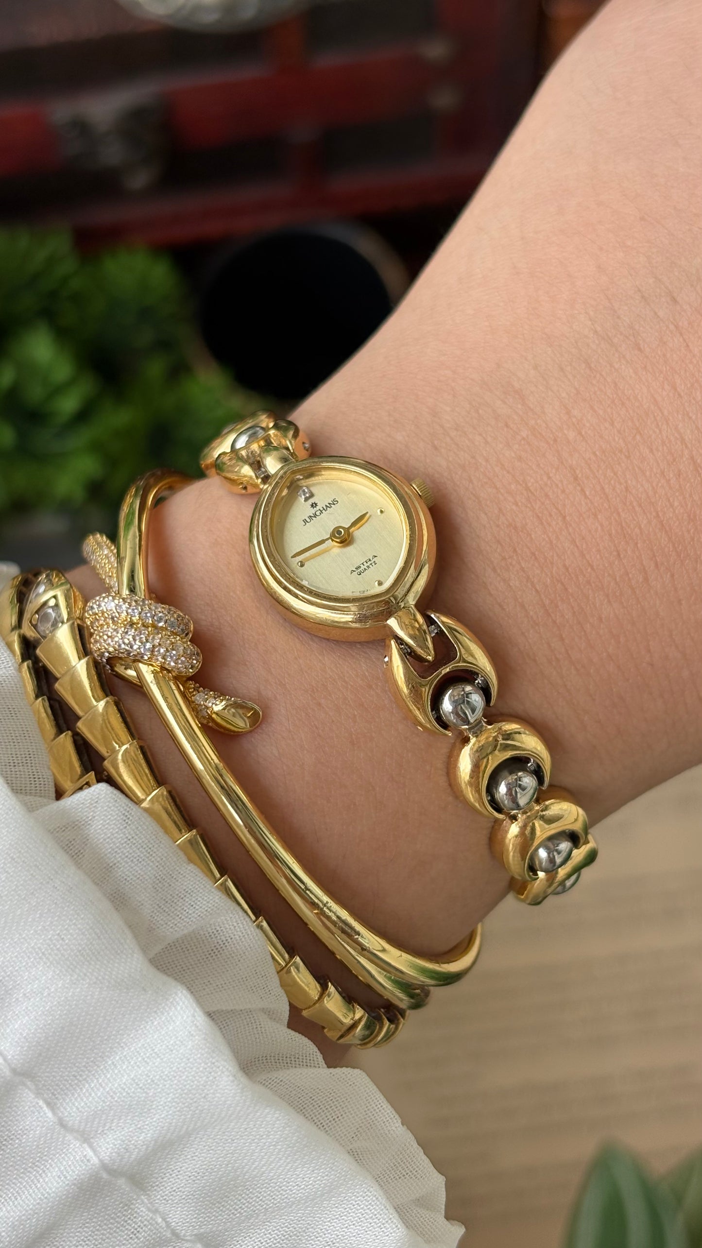 Vintage Dainty Junghans Astra Watch in Gold Tone Almond Dial Quartz