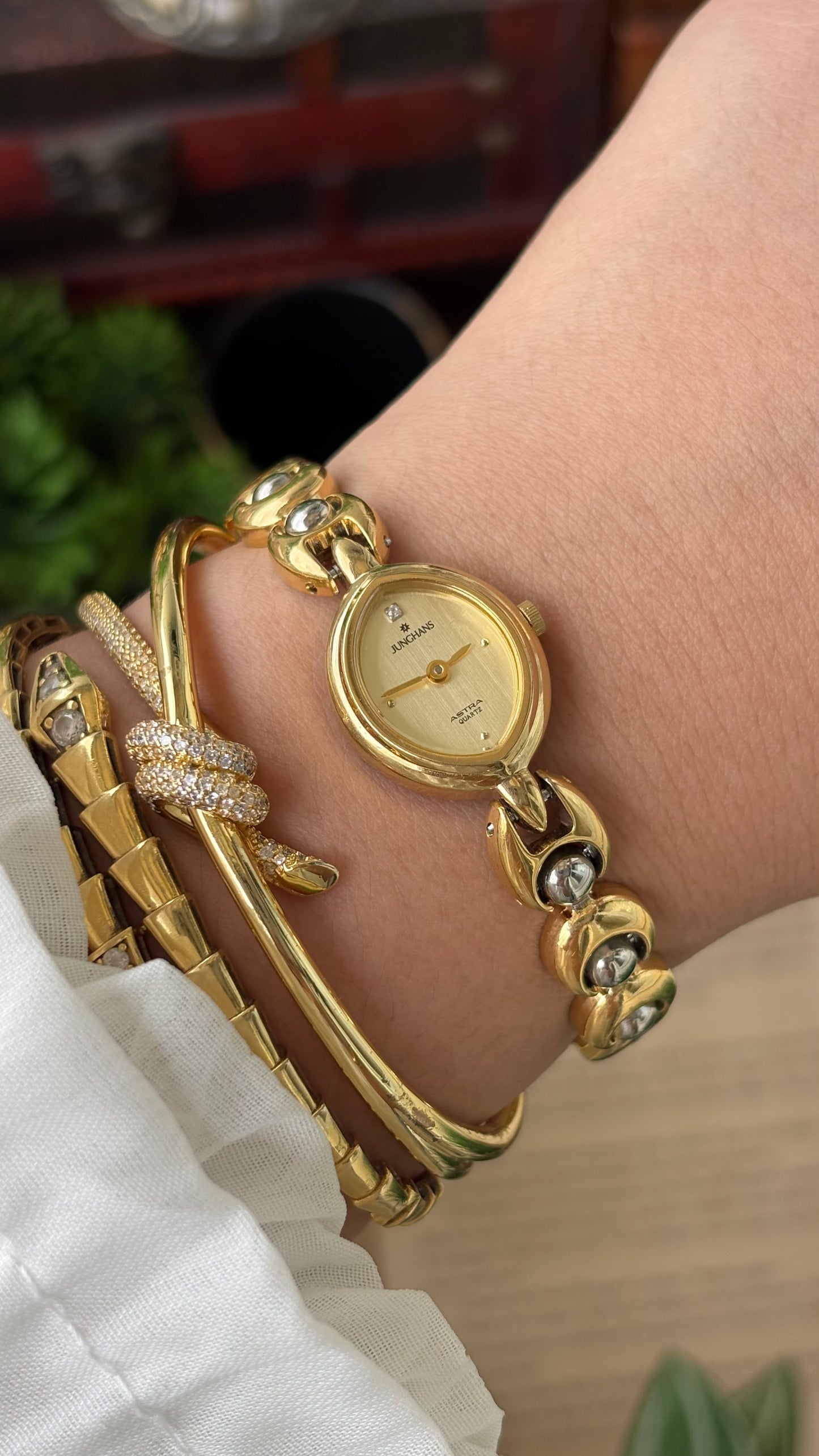 Vintage Dainty Junghans Astra Watch in Gold Tone Almond Dial Quartz