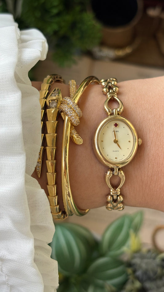 Extremely Rare Vintage Alba Seiko Watch in Gold Tone Oval Face with Genuine Ruby Quartz