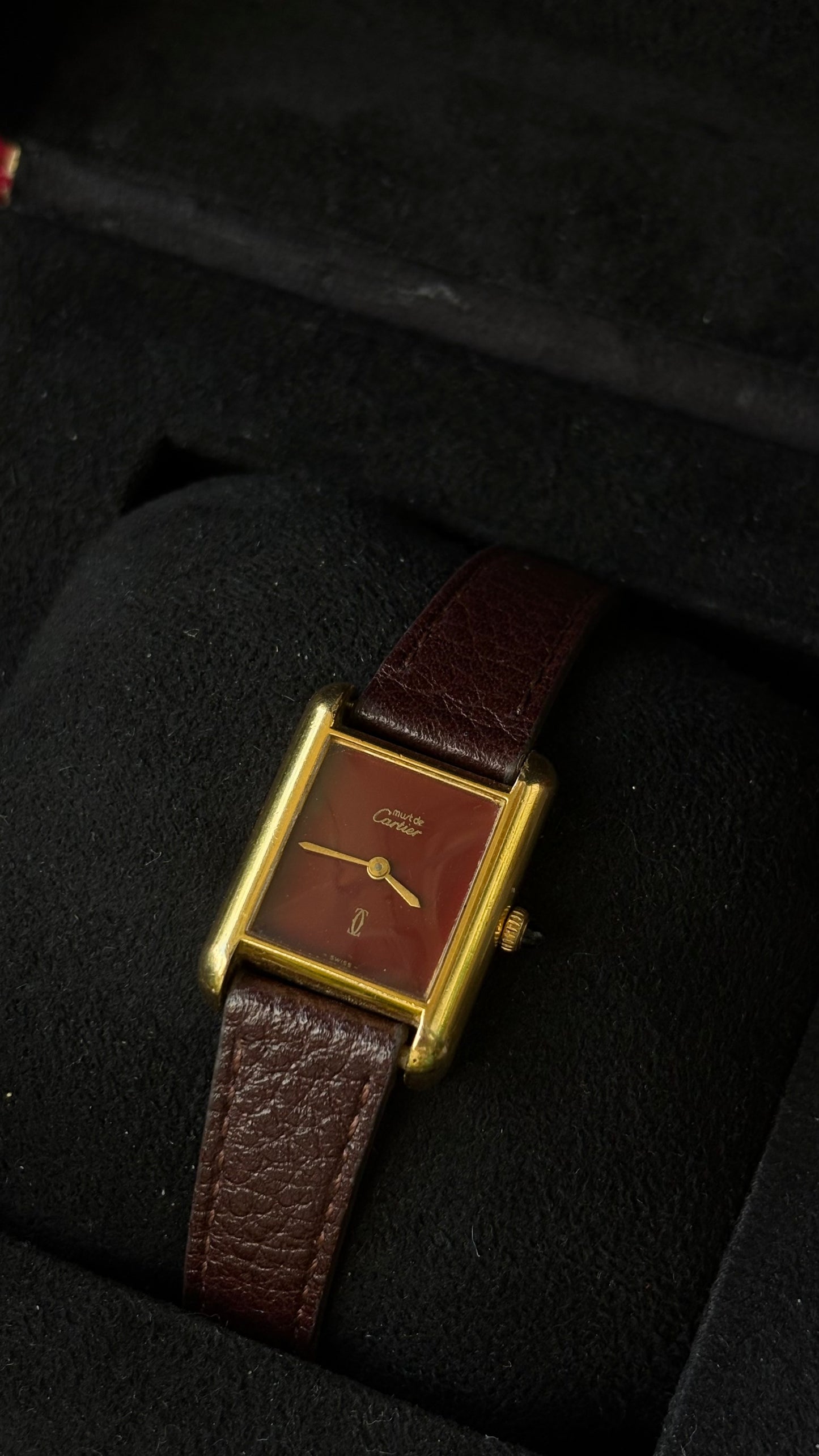 Extremely Rare Vintage 1980s Must De Tank Cartier Vermeil Manual Winding Watch in Burgundy Leather Burgundy Red Dial Gold Tone Case