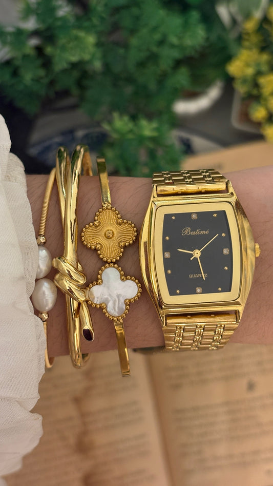 Vintage Bestime Black Dial Barrel Watch in Gold Tone Quartz