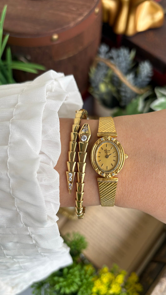 Vintage Bulova Swiss Watch in Gold Tone with Four Diamonds