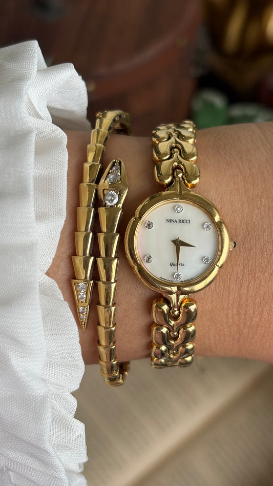 Vintage Nina Ricci Watch in Gold Tone Mother of Pearl Dial Flower Art Deco
