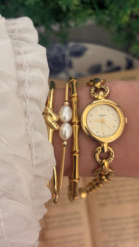 Vintage Marie Claire Round Link Logo Watch in Gold Tone Quartz