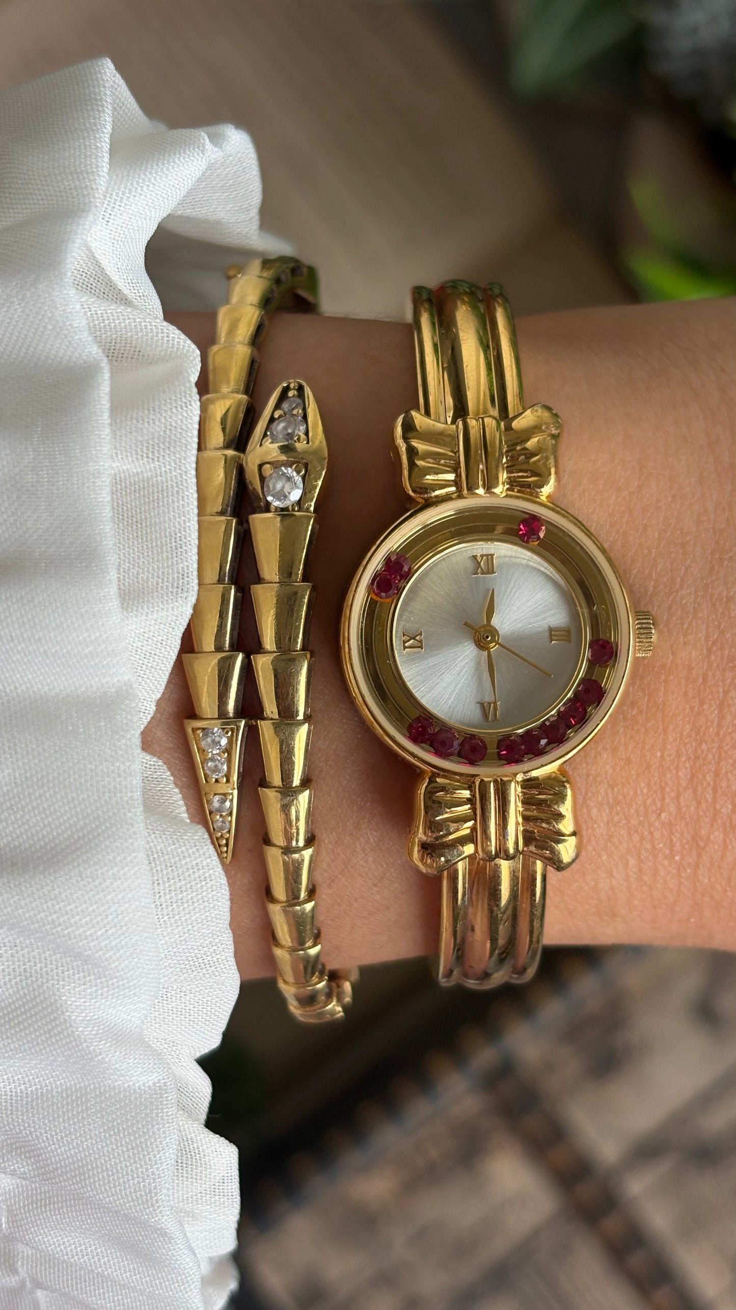 Vintage Coquette Watch in Gold Tone with Dancing Rubies