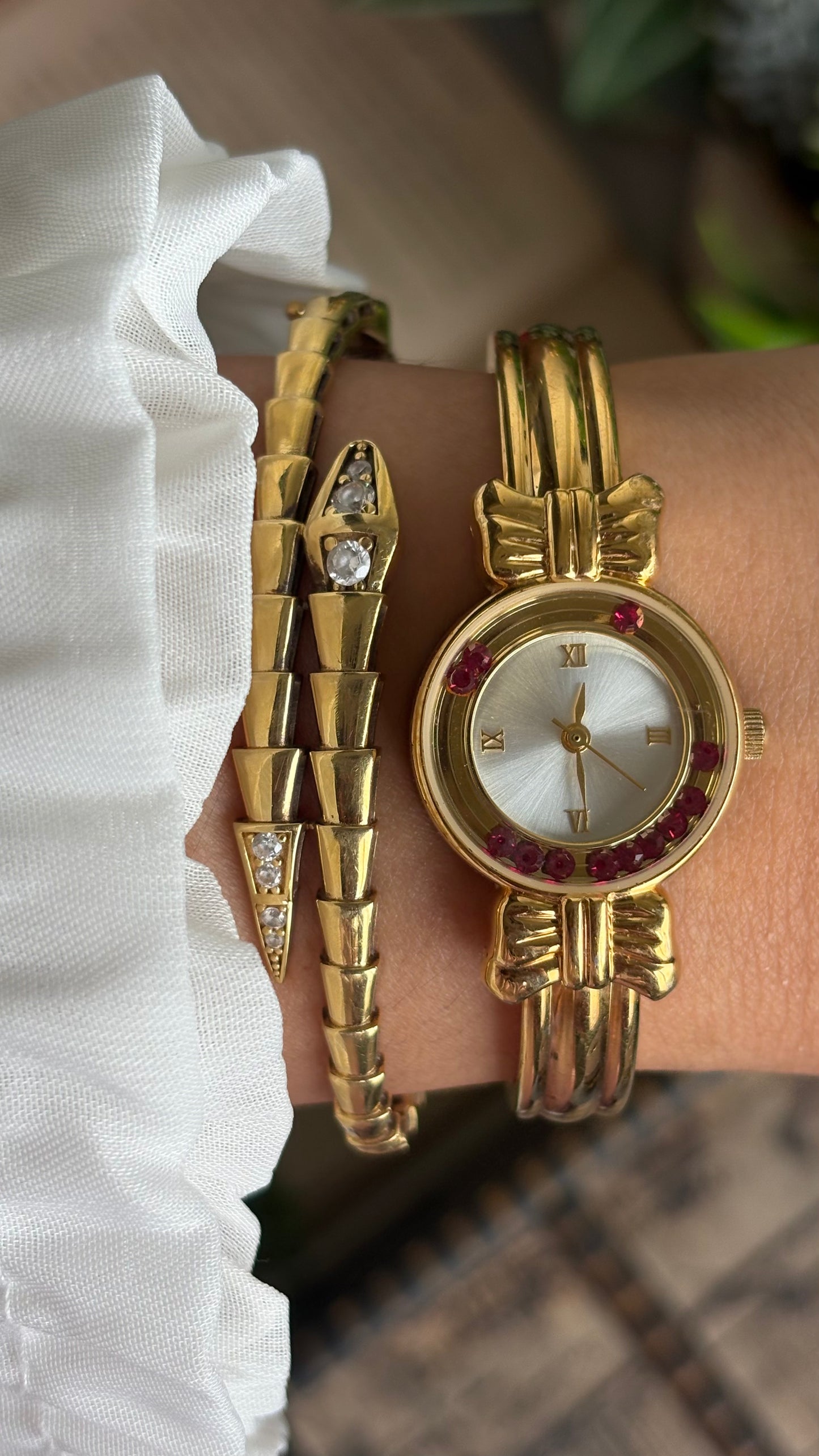 Vintage Coquette Watch in Gold Tone with Dancing Rubies
