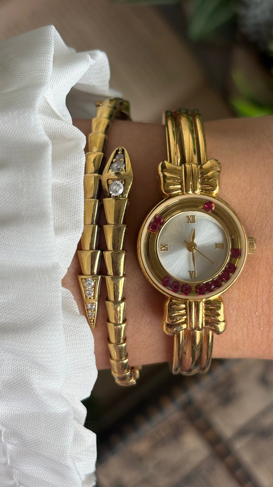 Vintage Coquette Watch in Gold Tone with Dancing Rubies