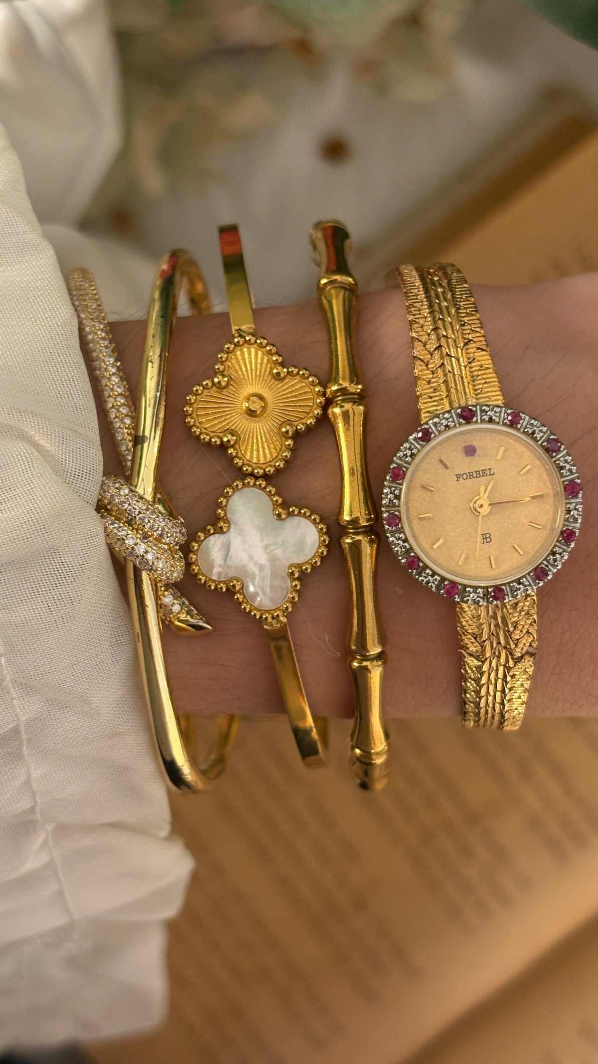 Extremely Rare Vintage Forbel Ruby Accented Bezel Dress Watch in Gold Tone Quartz
