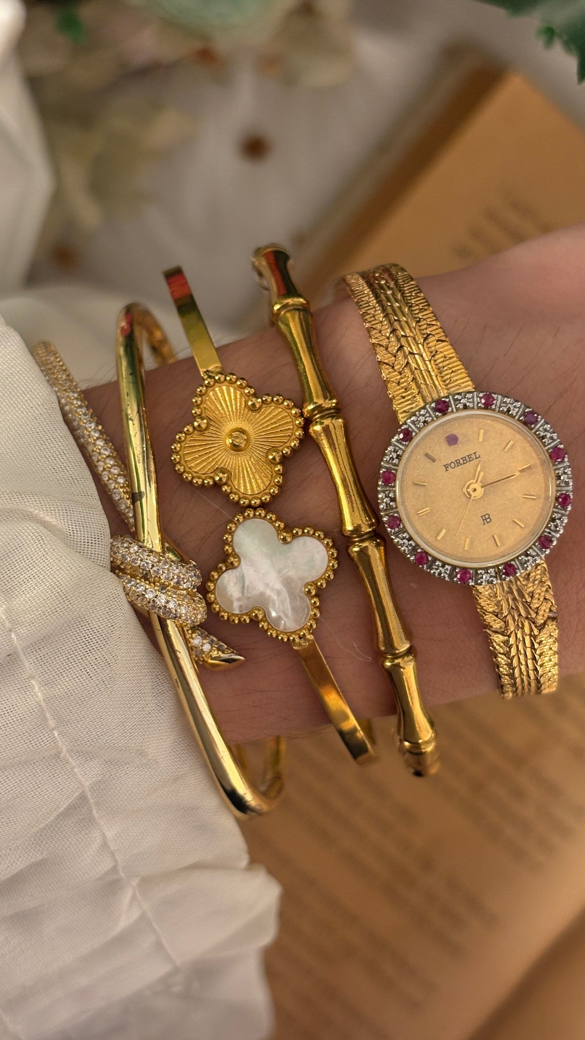 Extremely Rare Vintage Forbel Ruby Accented Bezel Dress Watch in Gold Tone Quartz