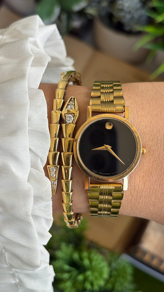 Vintage Movado Classic Swiss Watch in Gold Tone Black Dial