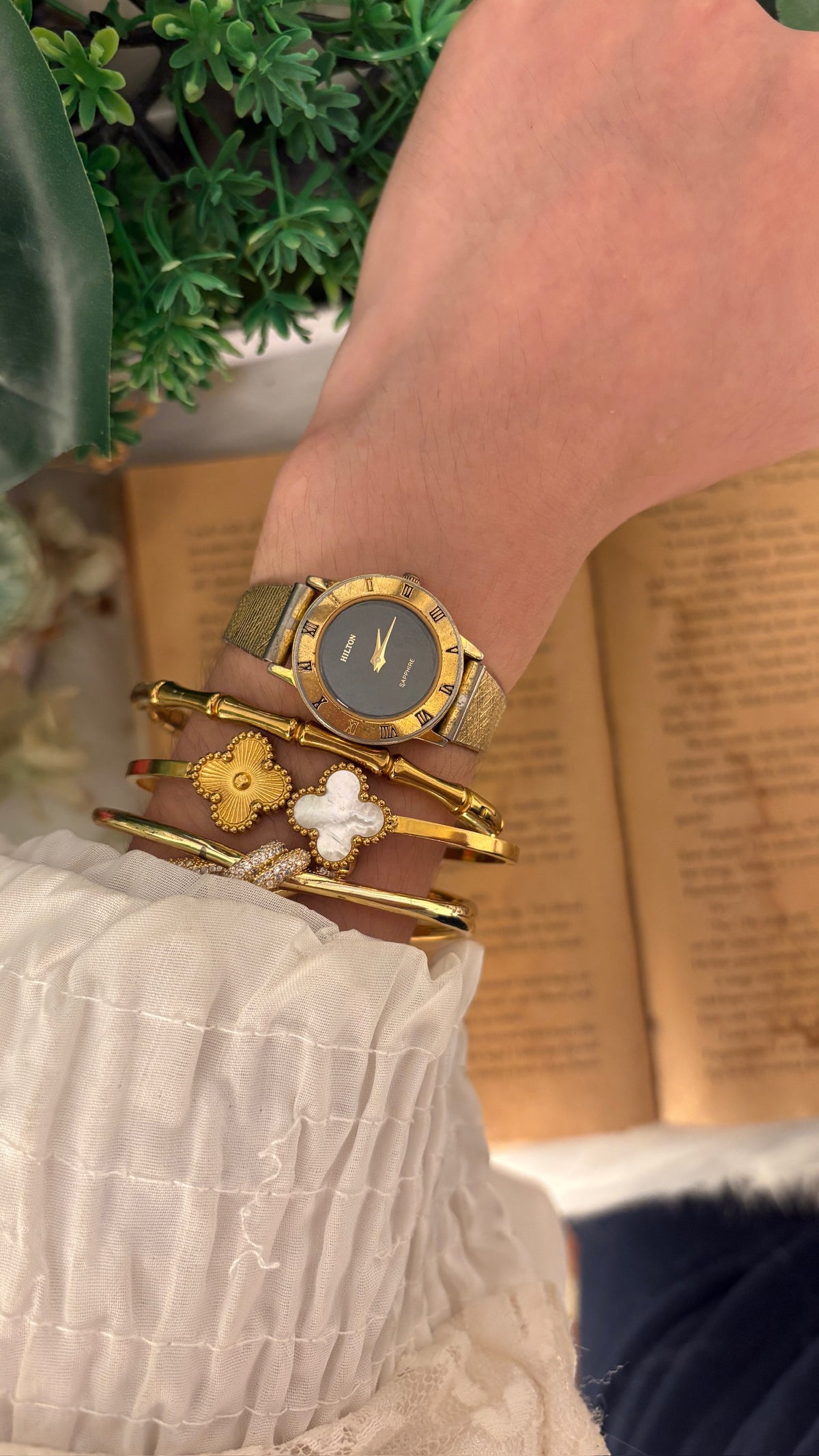 Rare Vintage Hilton Black Dial Sapphire Glass Dress Watch in Gold Tone Quartz
