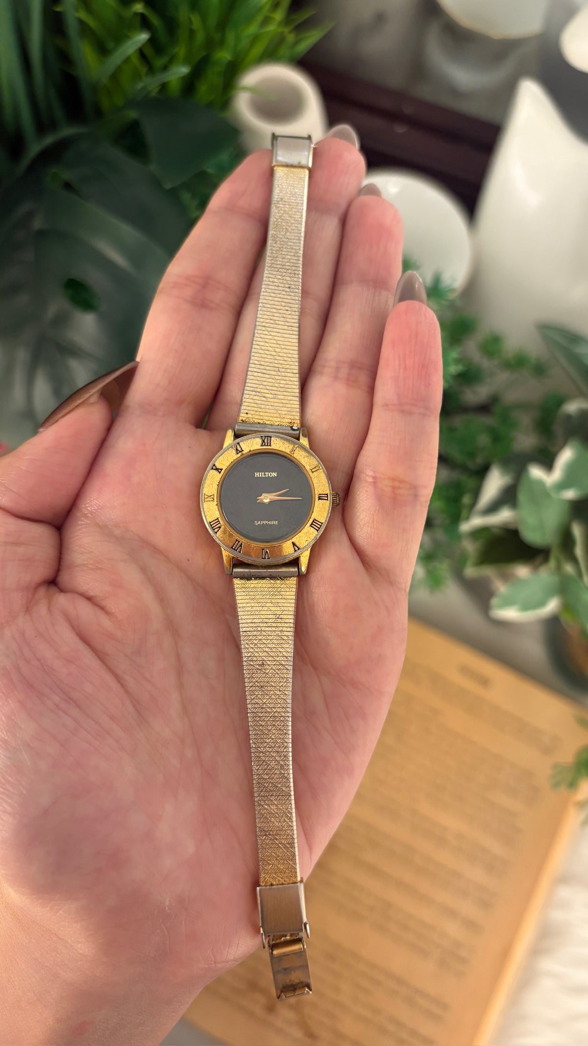 Rare Vintage Hilton Black Dial Sapphire Glass Dress Watch in Gold Tone Quartz