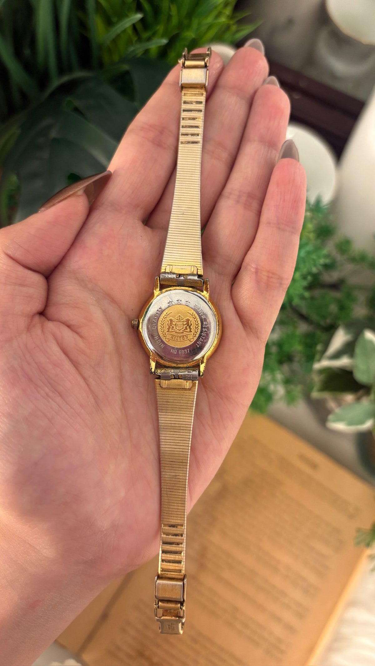 Rare Vintage Hilton Black Dial Sapphire Glass Dress Watch in Gold Tone Quartz