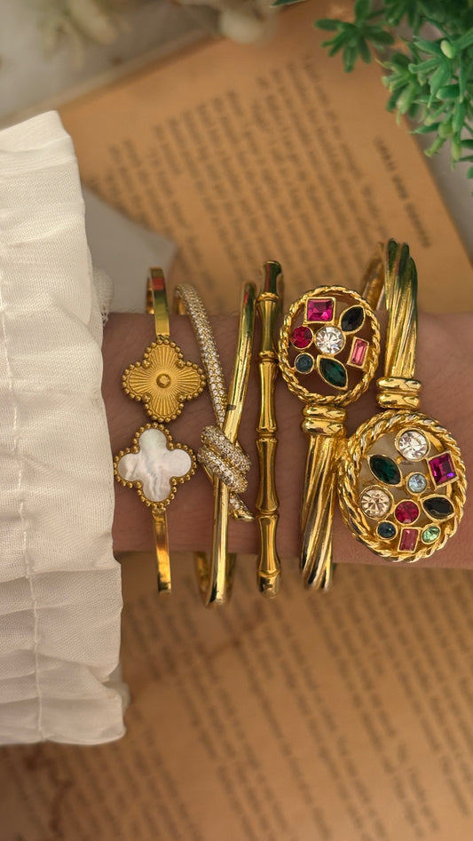 Extremely Rare Xanadu Bejeweled Cable Peekaboo Watch in Gold Tone Quartz