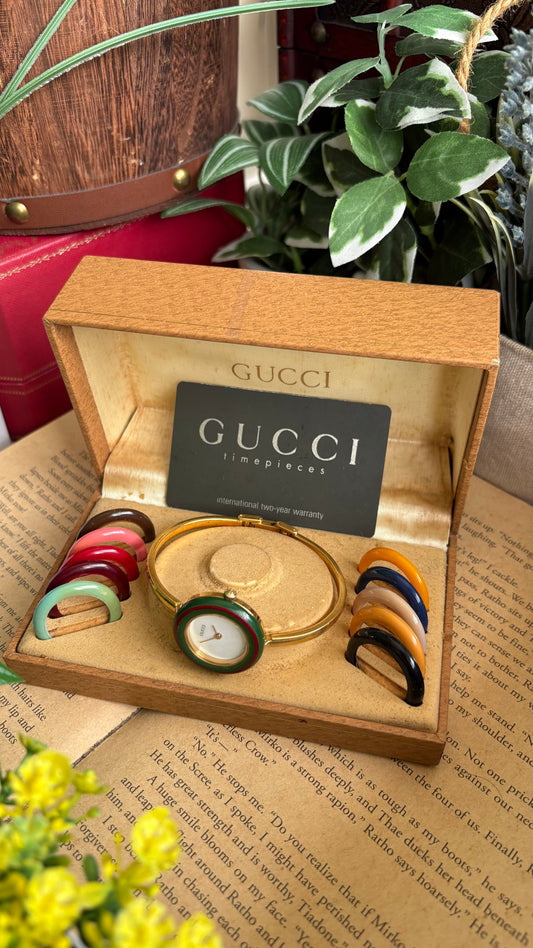 Vintage Gucci 1100L Interchangeable Bezel Set Bangle Watch in Gold Tone