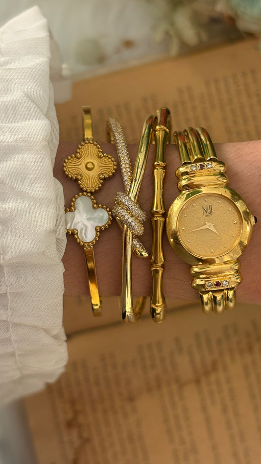 Rare Vintage Nui Ruby Accent Bangle Watch in Gold Tone Quartz
