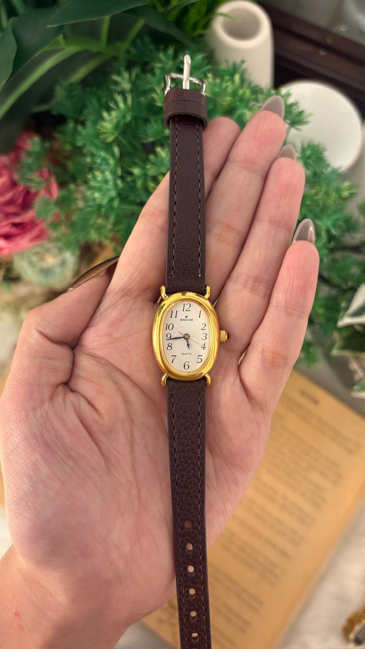Vintage Junghans Oval Dial Watch in Gold Tone Black Leather Quartz