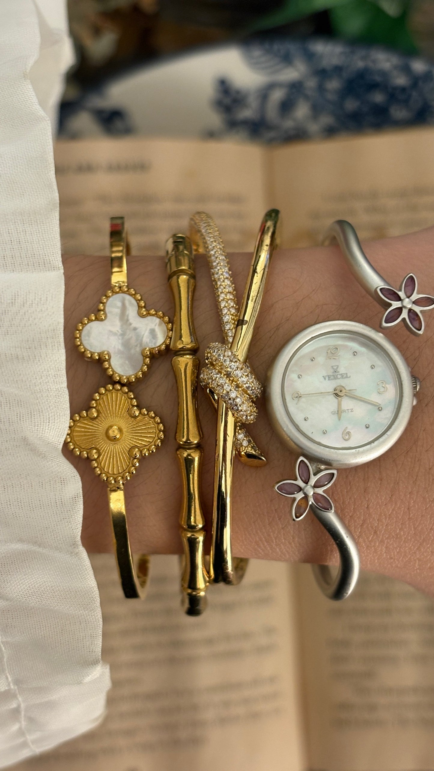 Rare Vintage Vexcel Flower Accent Mother of Pearl Dial Bangle Watch in Silver Tone Quartz