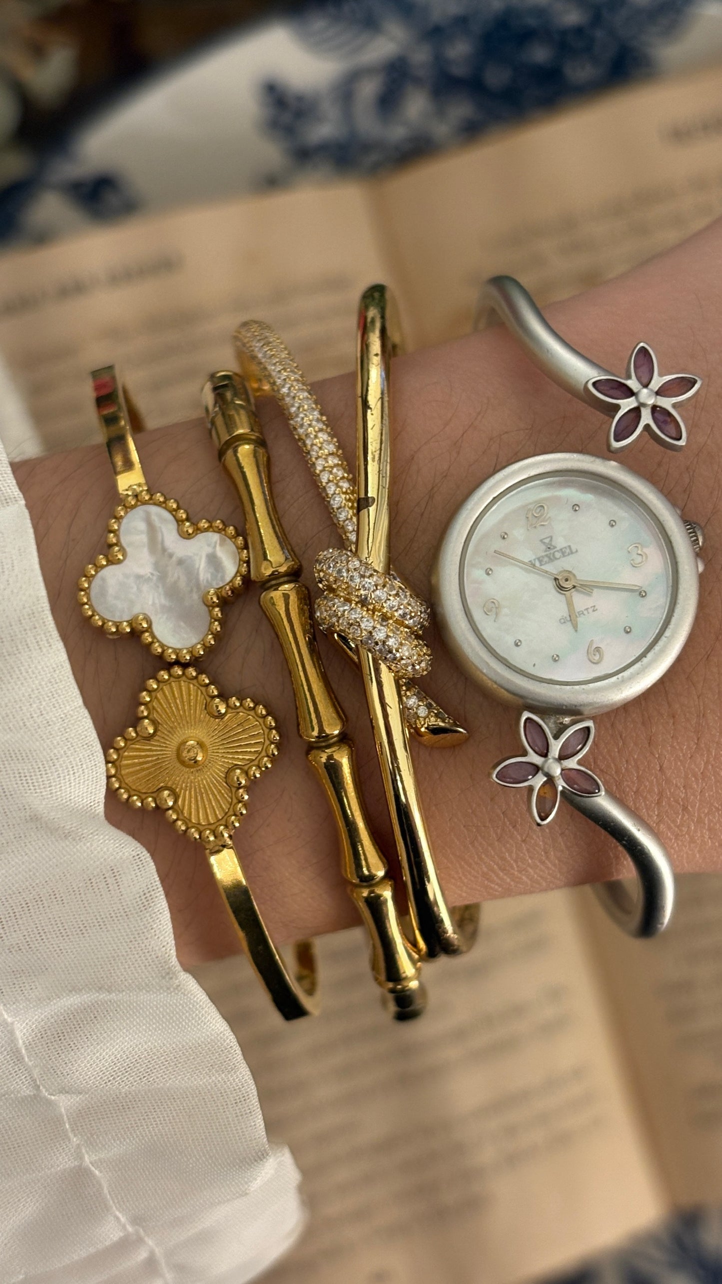 Rare Vintage Vexcel Flower Accent Mother of Pearl Dial Bangle Watch in Silver Tone Quartz