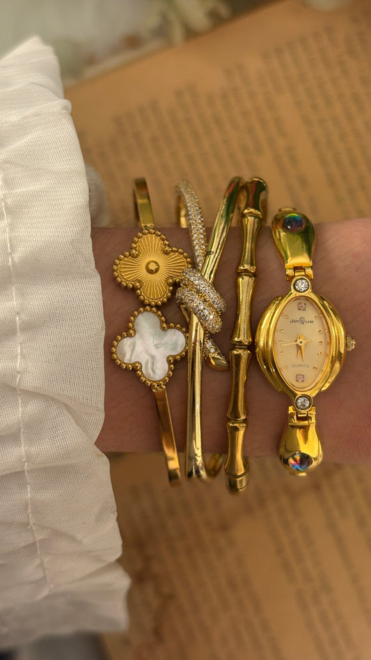 Rare Dainty Vintage Jinque Oval Dial Rhinestone Accents Bracelet Watch in Gold Tone Quartz