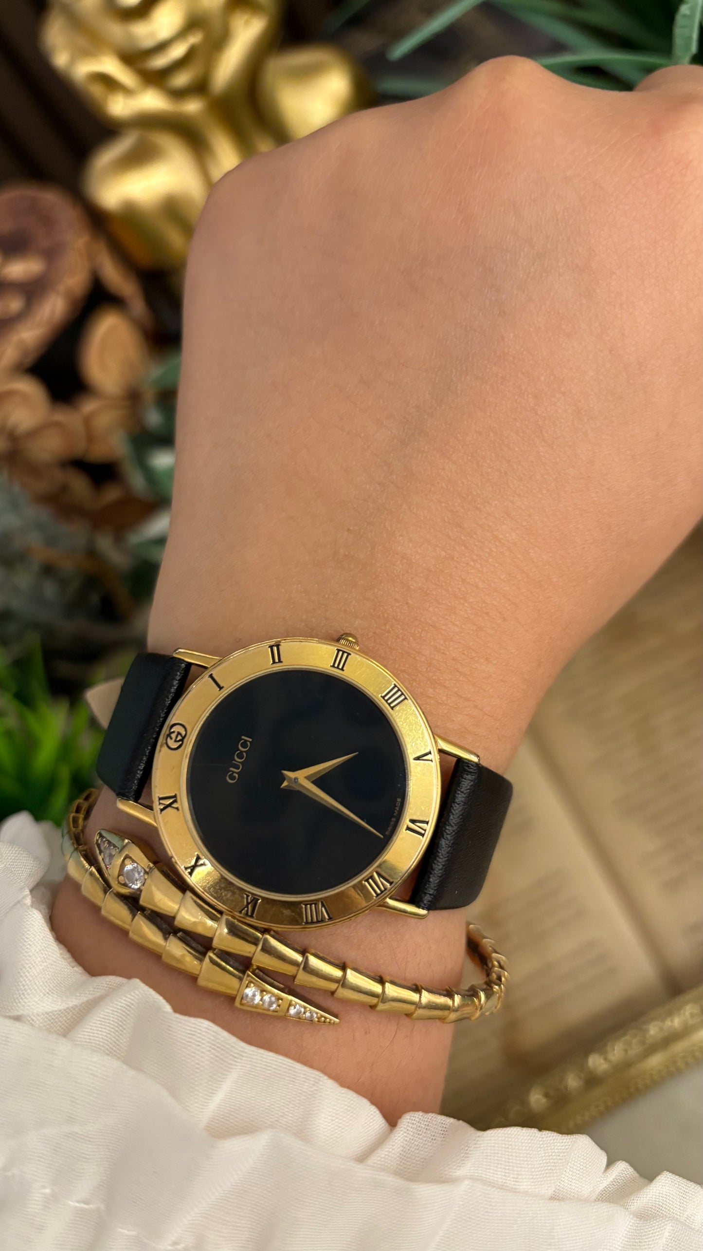Vintage Gucci Swiss 3000 M Engraved Roman Bezel Mens Watch in Gold Tone Black Leather Blackout Dial Quartz