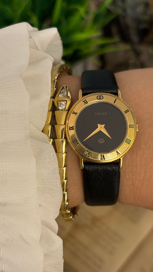 Vintage Gucci Swiss 3000L Engraved Roman Bezel Watch in Gold Tone Black Leather Blackout Dial Quartz