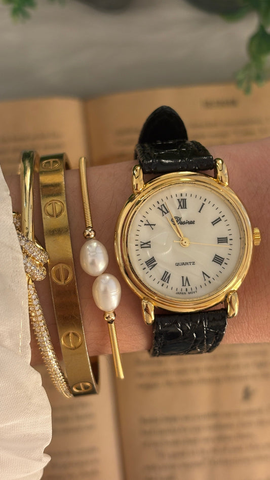 Vintage Desiree Roman Mother of Pearl Dial Watch in Gold Tone Black Leather Quartz
