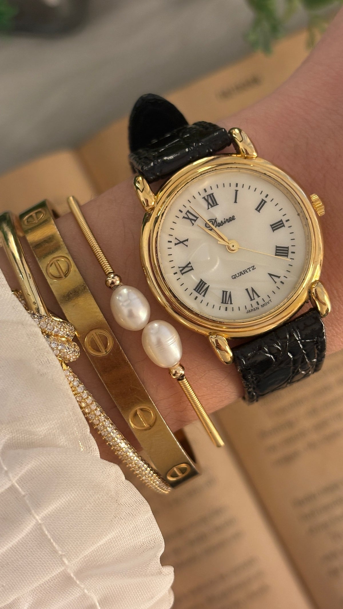Vintage Desiree Roman Mother of Pearl Dial Watch in Gold Tone Black Leather Quartz
