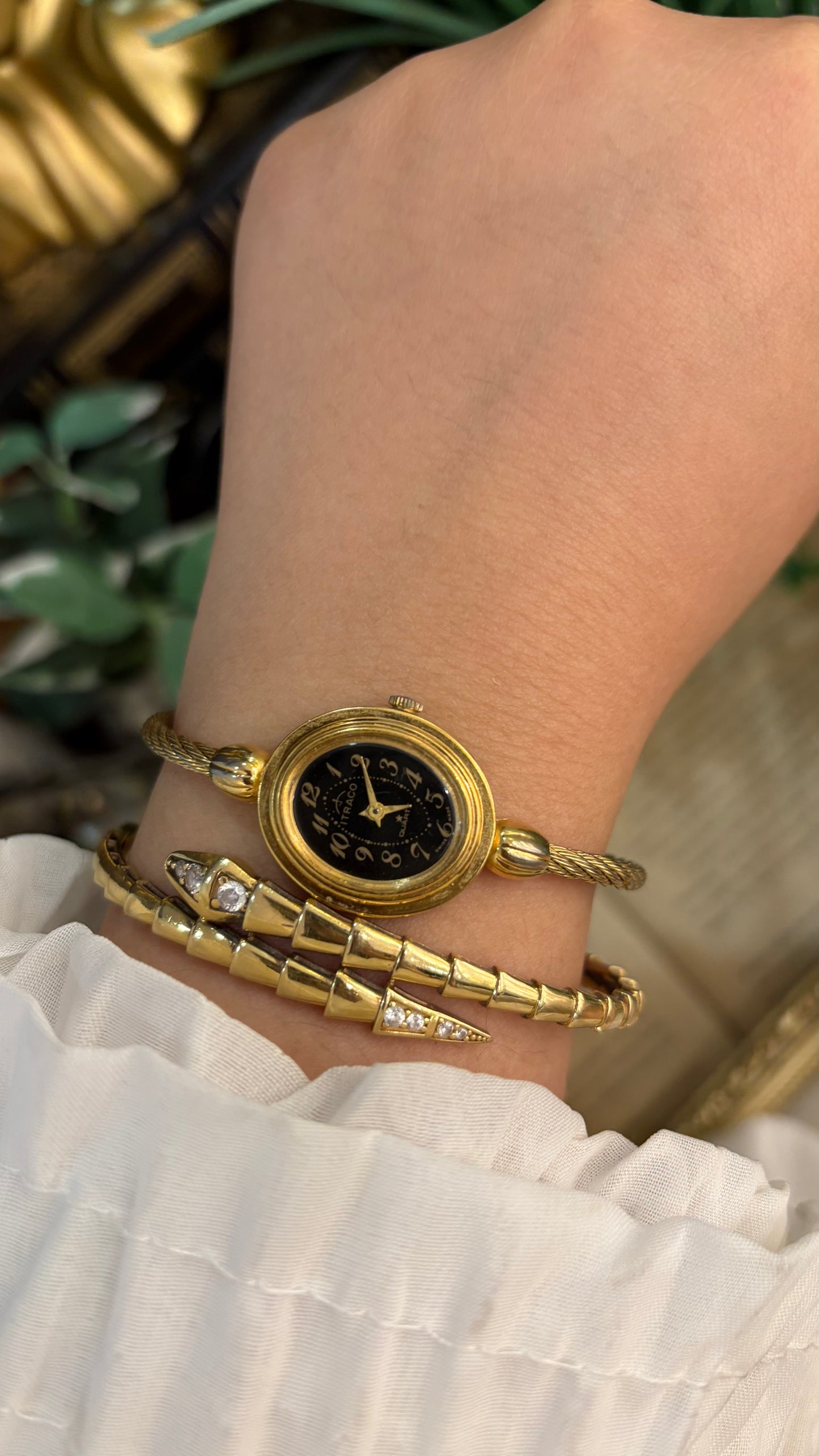 Rare Elegant Vintage Itraco Twisted Bangle Watch in Gold Tone Black Oval Dial Quartz