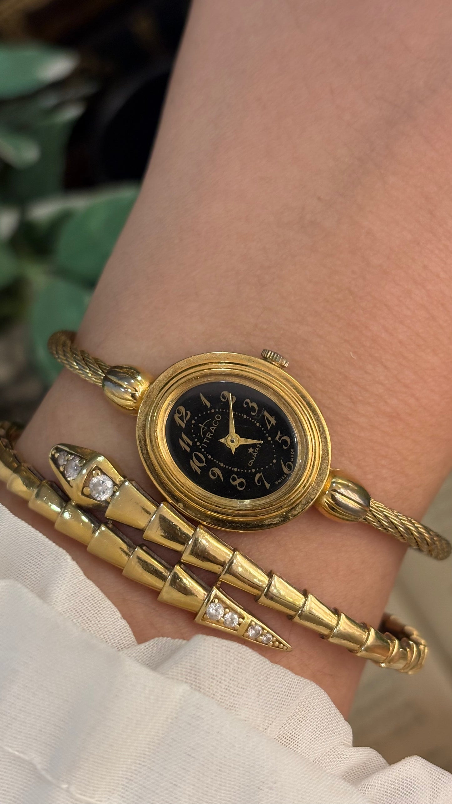 Rare Elegant Vintage Itraco Twisted Bangle Watch in Gold Tone Black Oval Dial Quartz