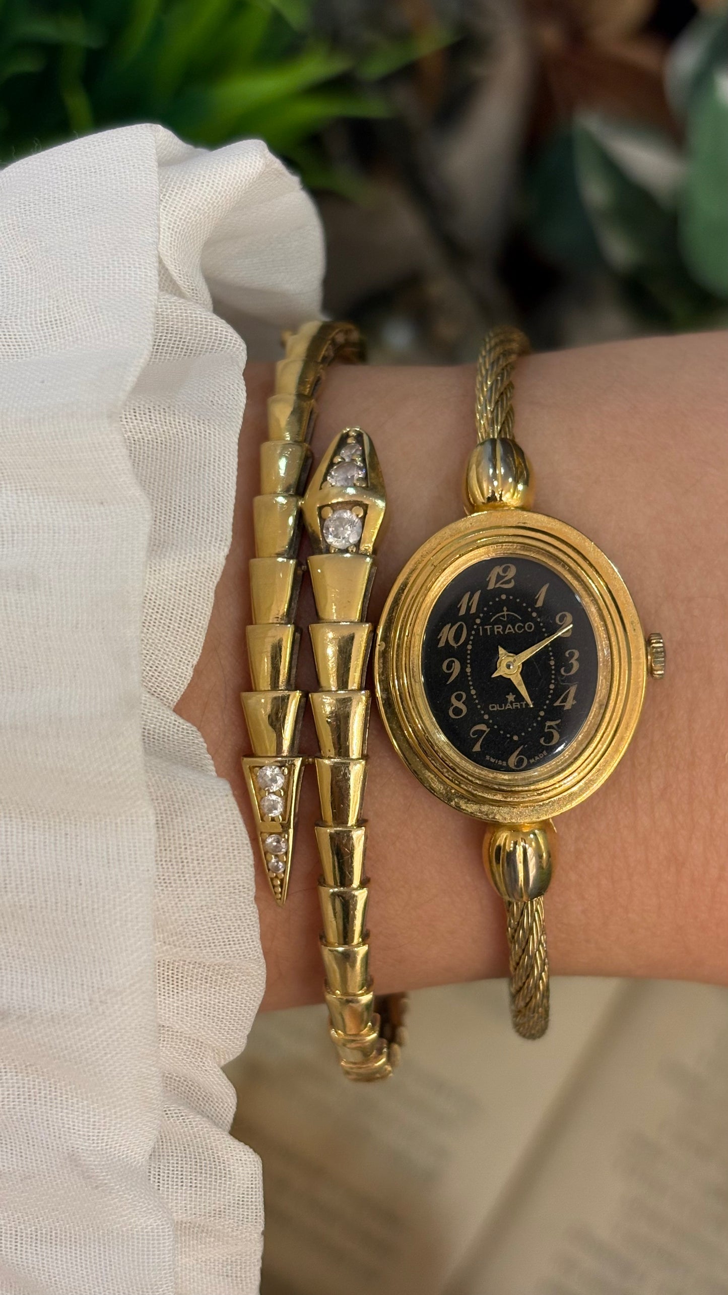 Rare Elegant Vintage Itraco Twisted Bangle Watch in Gold Tone Black Oval Dial Quartz